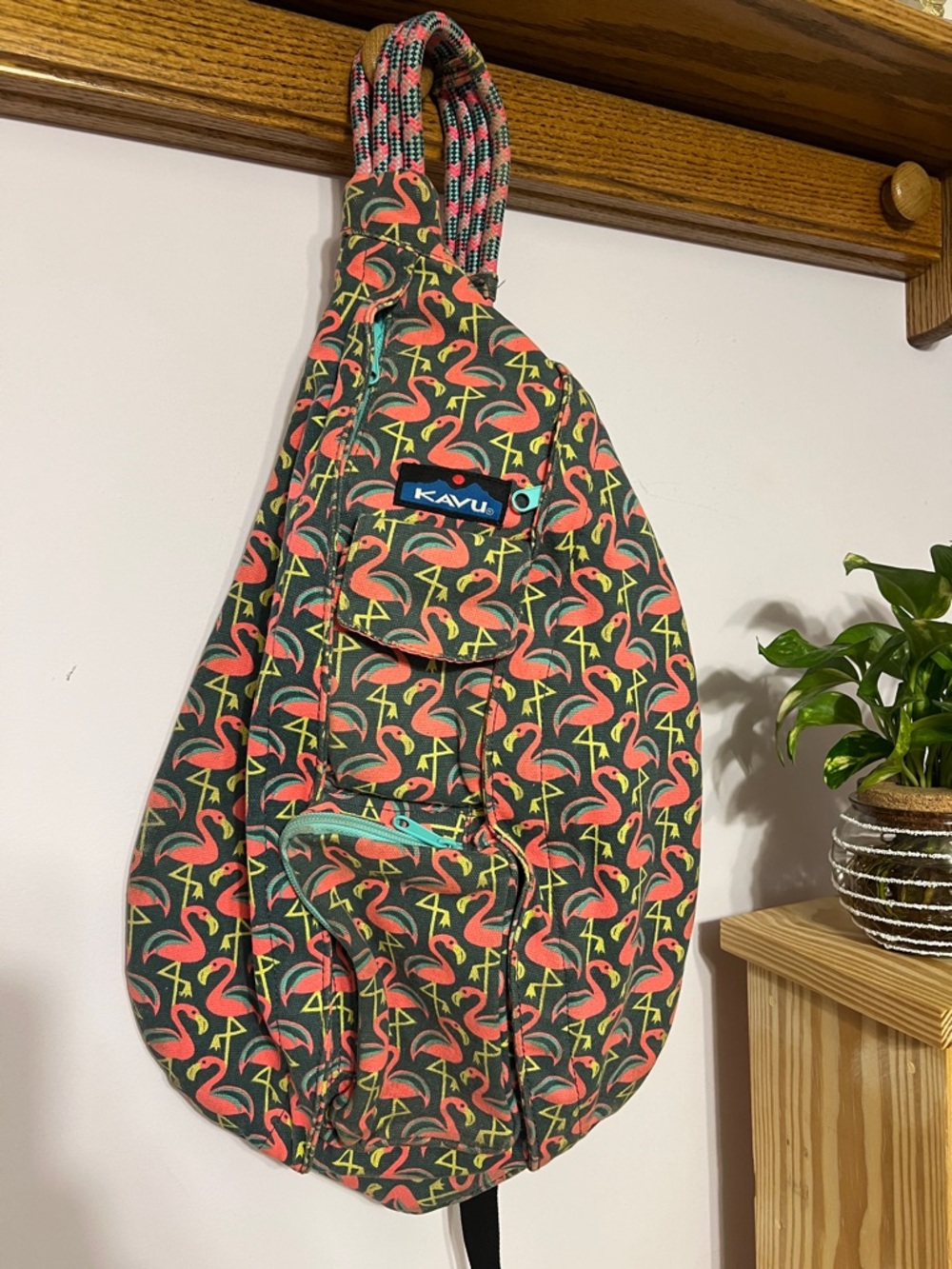KAVU Flamingo Print Sling Bag in Pink and Greenish/Blueish Color